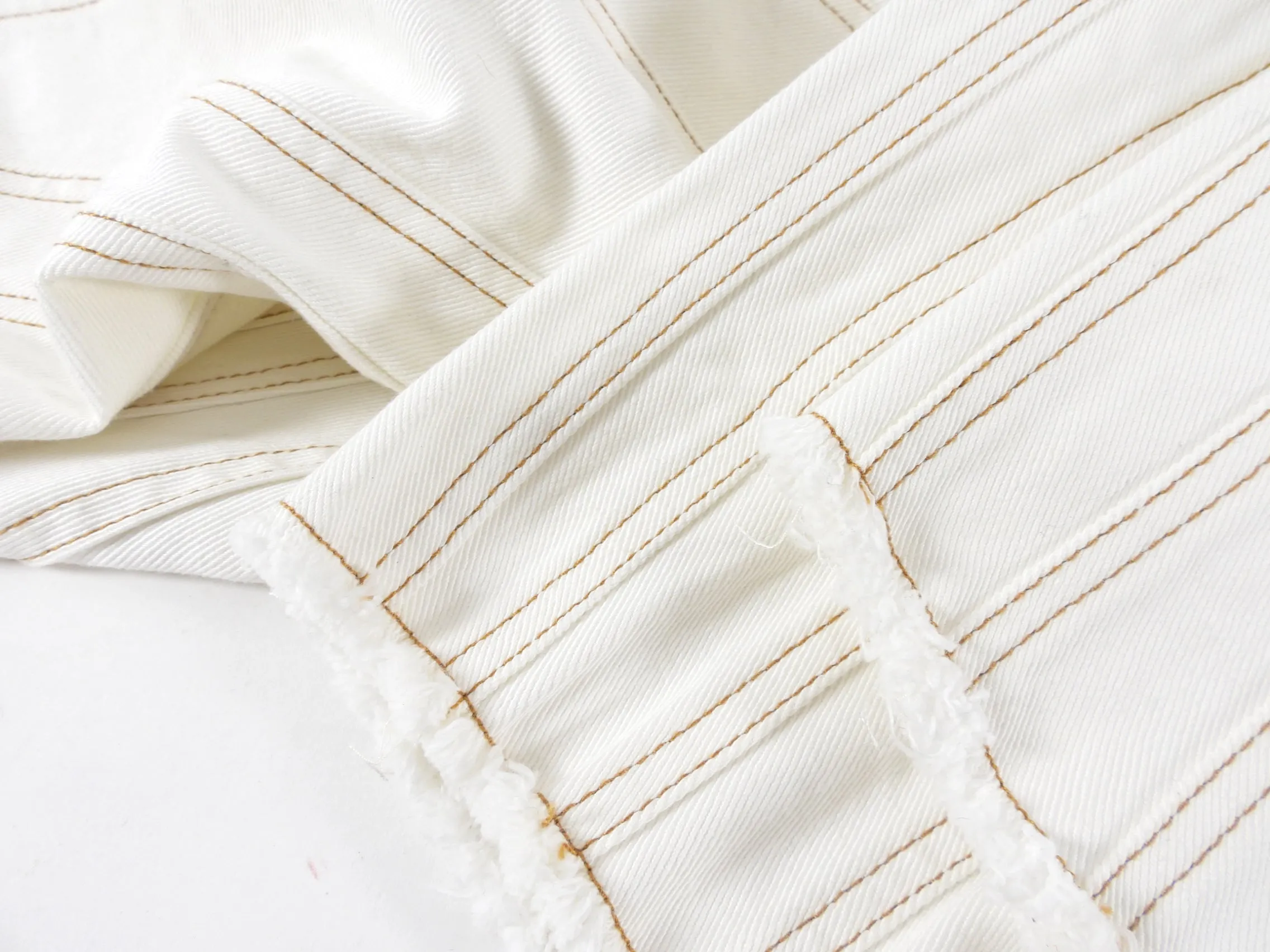 Mugler Cream Seamed Twist Denim Jeans - FR38 / USA 6