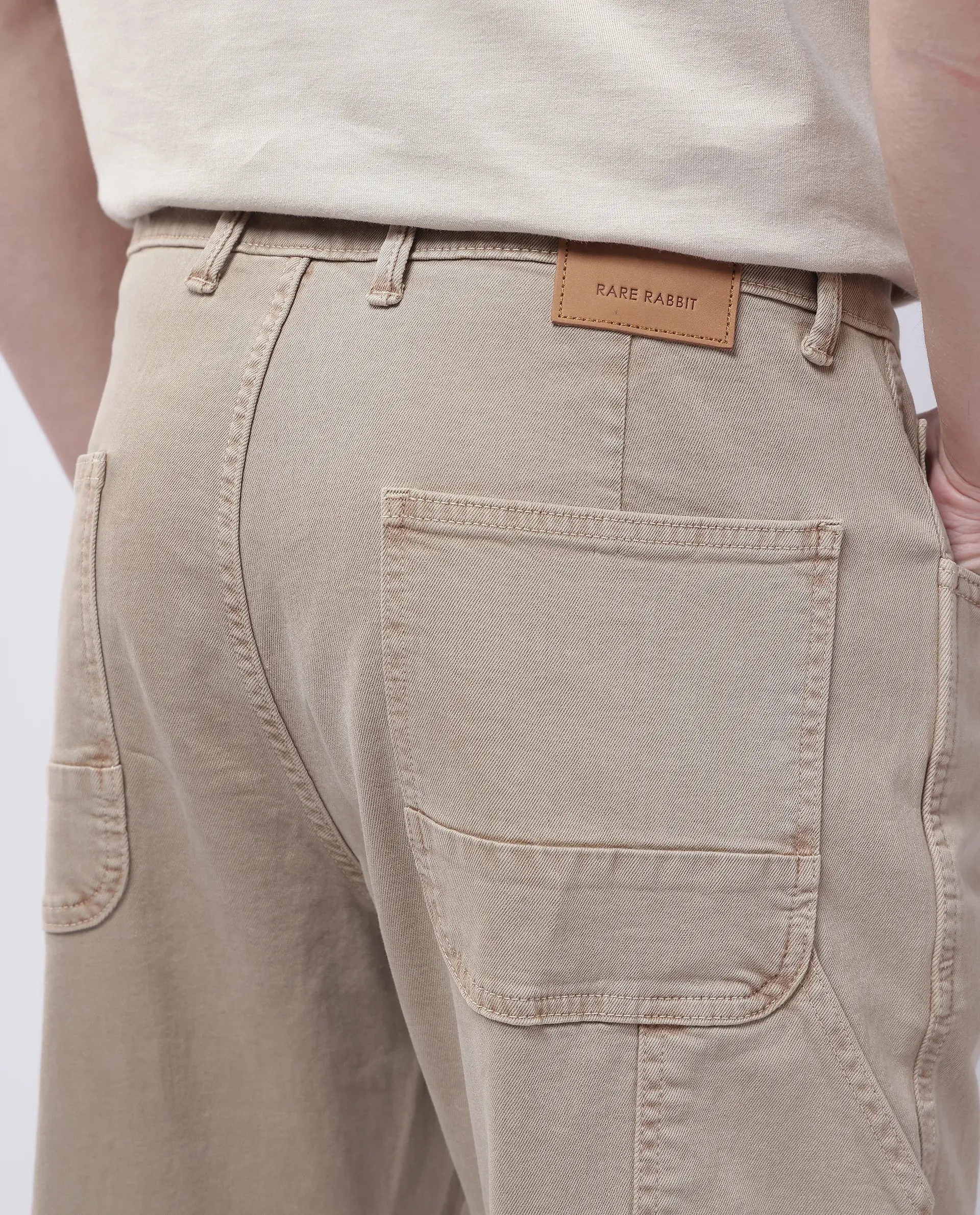 Rare Rabbit Men Arni Light Beige Cotton Viscose Fabric Carpenter Fit Plain Denim Pant